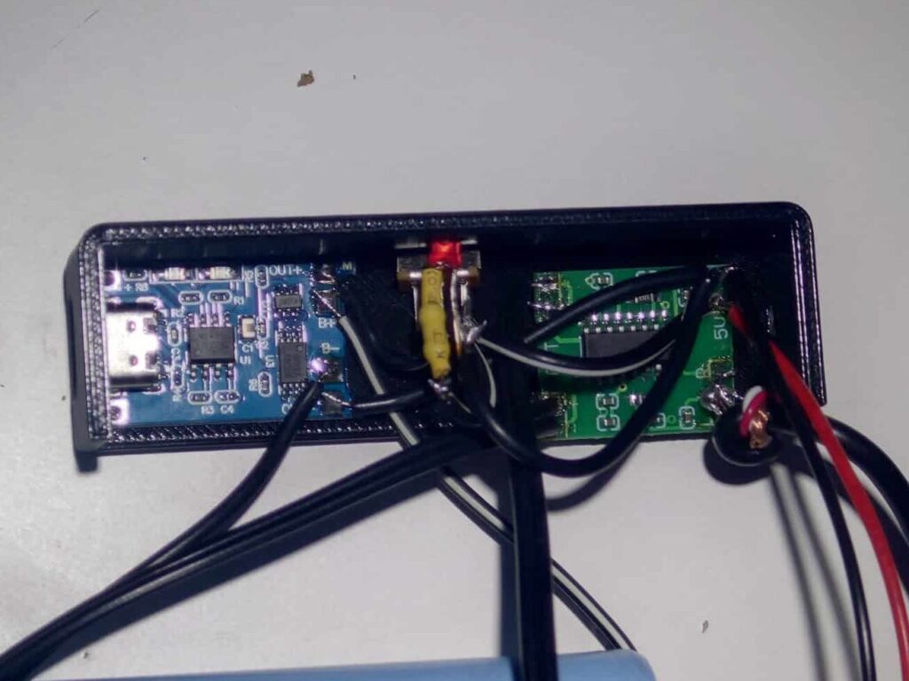 Inside-view of a small speaker, showing its components in position